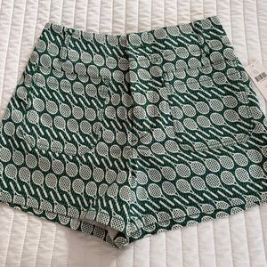 Maeve High Waist Green Patterned Shorts with tennis raquets